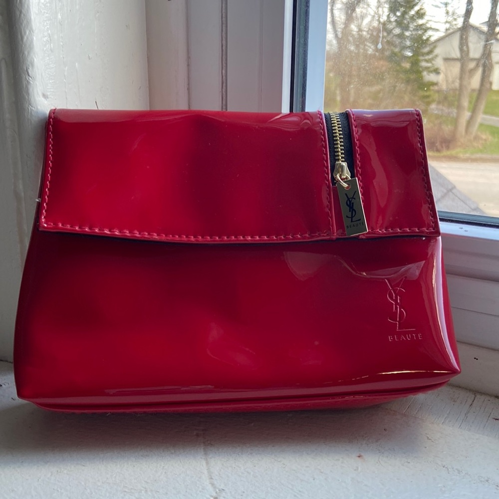 YSL carrying clutch